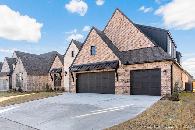 view of front of property with central AC