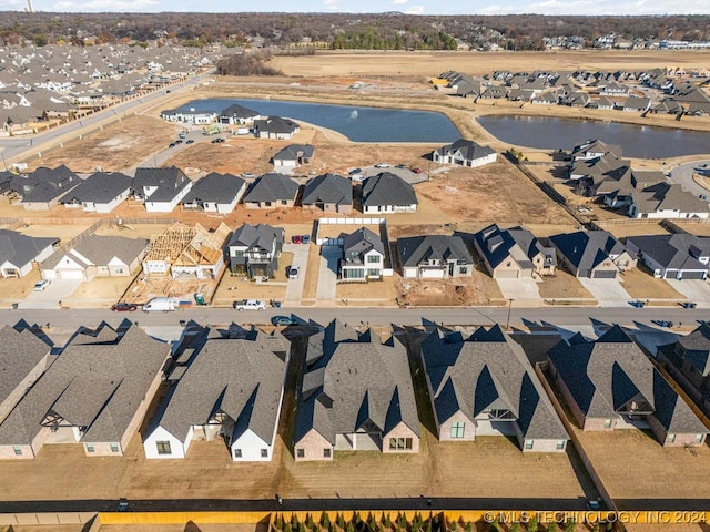 aerial view featuring a water view