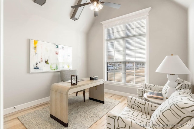 office area featuring ceiling fan, baseboards, and wood finished floors