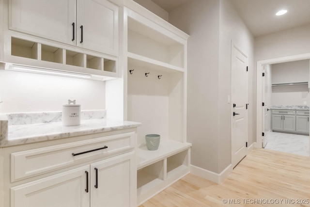 mudroom with light wood-style floors and recessed lighting