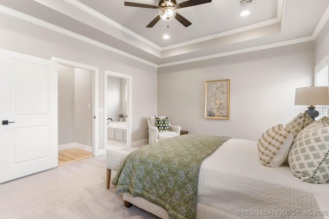 bedroom featuring a raised ceiling, light colored carpet, visible vents, ornamental molding, and baseboards