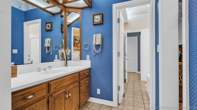 bathroom featuring tile floors and vanity