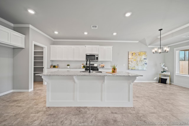 kitchen featuring white cabinets, a center island with sink, appliances with stainless steel finishes, and light tile floors