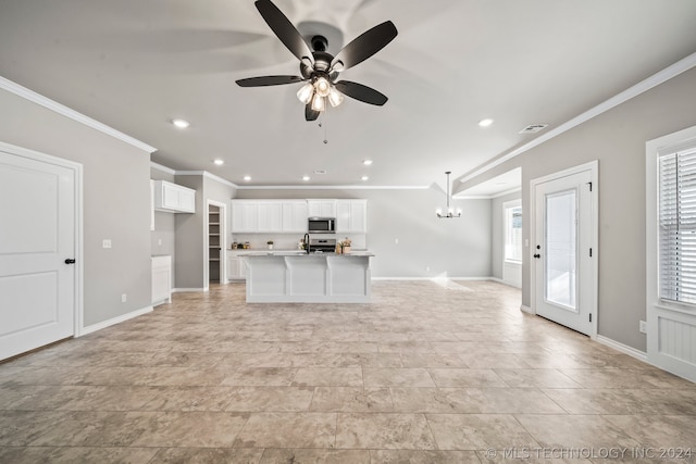 unfurnished living room with plenty of natural light, ceiling fan with notable chandelier, crown molding, and light tile flooring