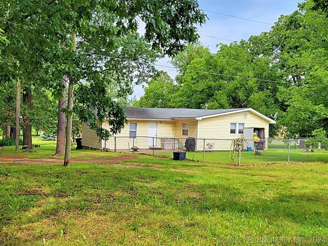 exterior space with a yard