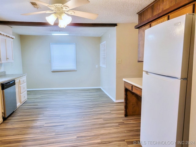 kitchen with dishwasher, ceiling fan, light hardwood / wood-style floors, a textured ceiling, and white fridge