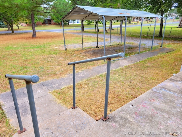 surrounding community featuring a yard