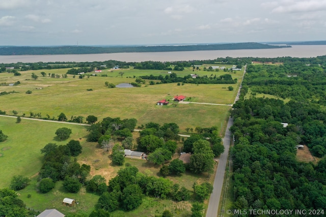 bird's eye view featuring a rural view and a water view