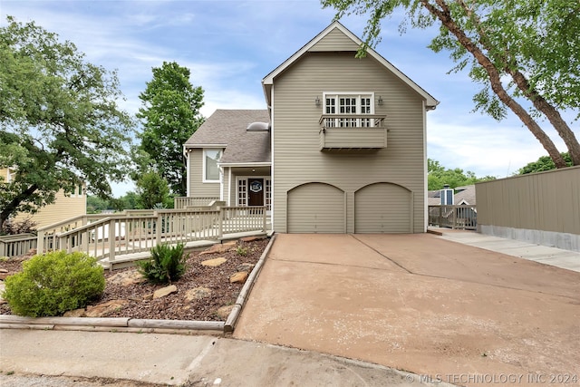 front of property with a balcony