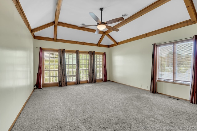 spare room with carpet flooring, ceiling fan, beamed ceiling, and high vaulted ceiling