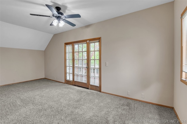 additional living space featuring ceiling fan, carpet floors, and vaulted ceiling