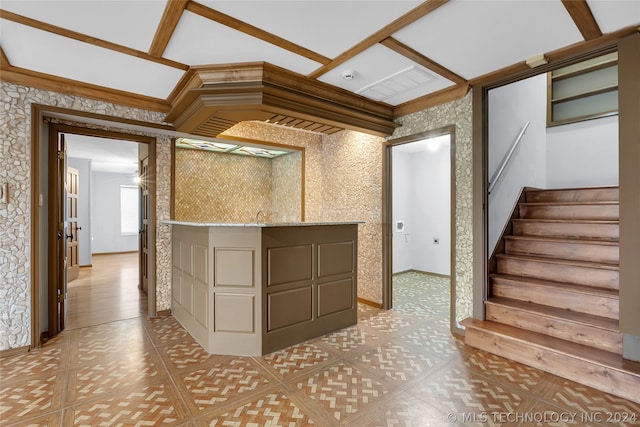 kitchen featuring beamed ceiling