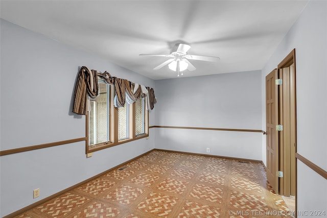 unfurnished room featuring ceiling fan