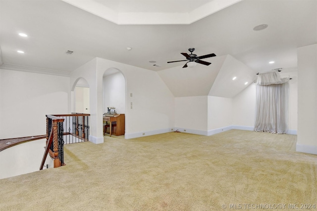 bonus room with ceiling fan, light carpet, and vaulted ceiling