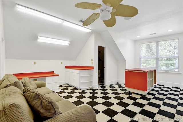 additional living space featuring ceiling fan and lofted ceiling