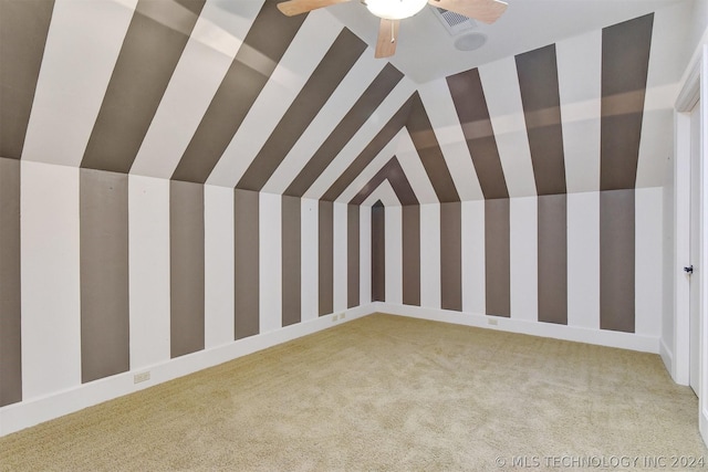 bonus room featuring carpet flooring and ceiling fan