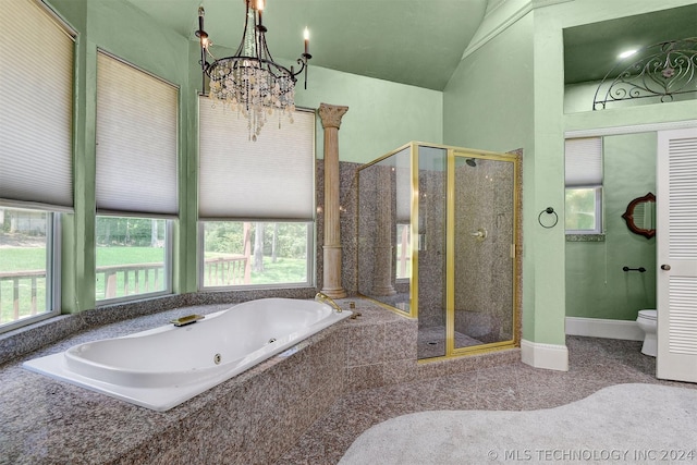 bathroom with separate shower and tub, toilet, vaulted ceiling, and a notable chandelier