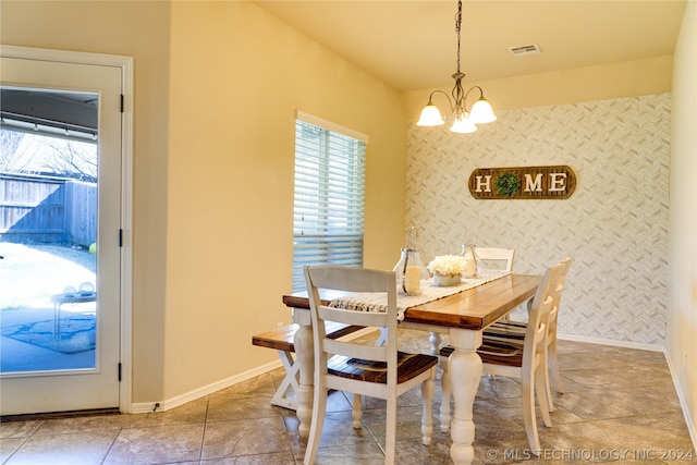 dining room featuring a chandelier