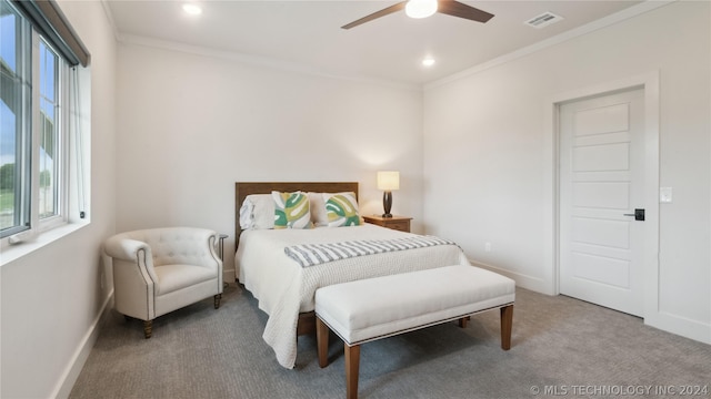 bedroom featuring carpet, ceiling fan, and crown molding