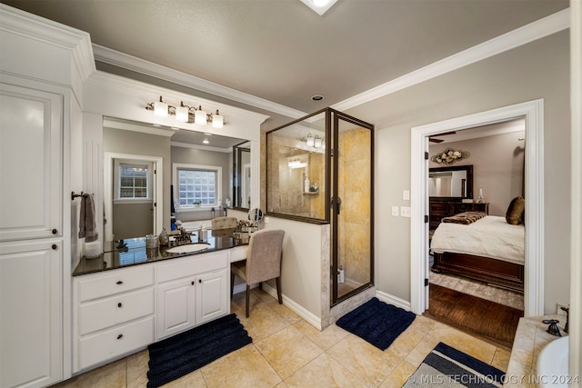 bathroom featuring vanity, crown molding, tile patterned floors, and plus walk in shower