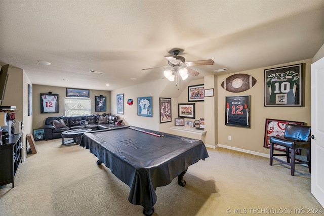 recreation room with pool table, a textured ceiling, light colored carpet, and ceiling fan