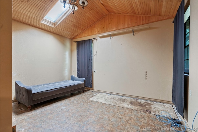 unfurnished bedroom with wooden ceiling and vaulted ceiling with skylight