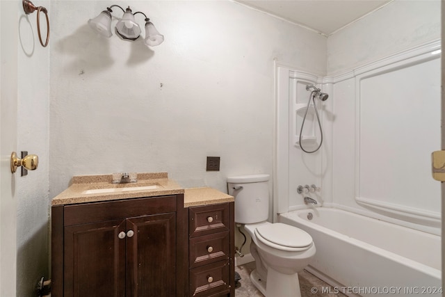 full bathroom featuring washtub / shower combination, tile flooring, vanity, and toilet