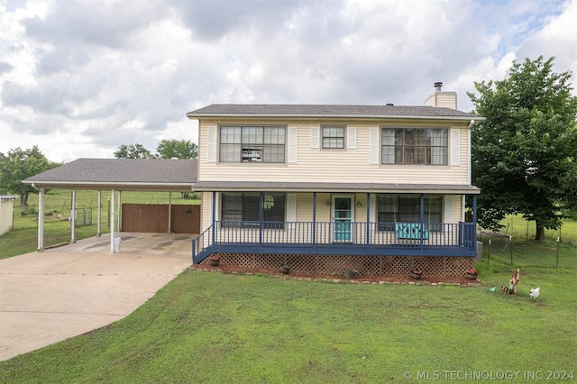 view of front of property featuring covered porch, a carport, and a front lawn