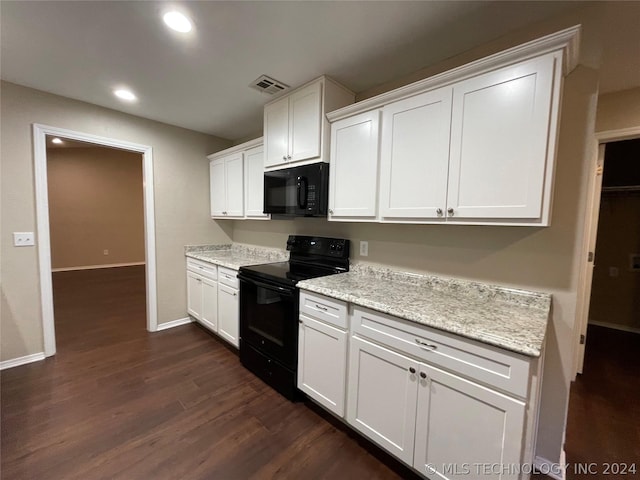 kitchen featuring white cabinets, light stone counters, dark wood-type flooring, and black appliances