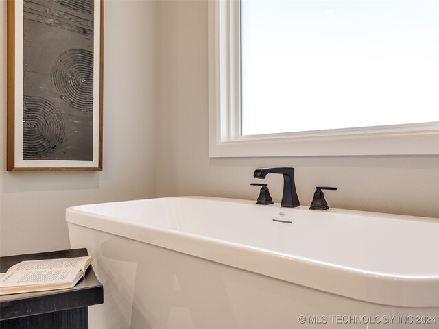 bathroom featuring a bathing tub