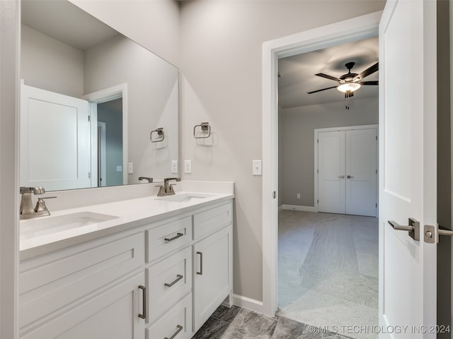 bathroom featuring vanity and ceiling fan