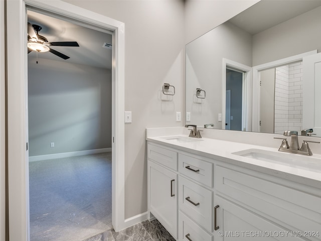 bathroom featuring vanity and ceiling fan