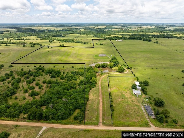 birds eye view of property featuring a rural view