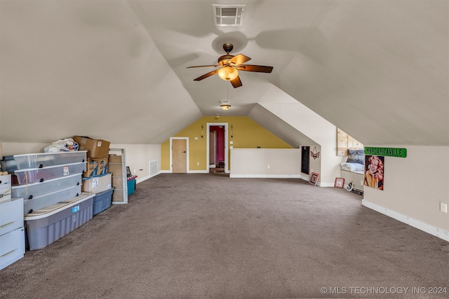 bonus room with carpet floors, ceiling fan, and vaulted ceiling