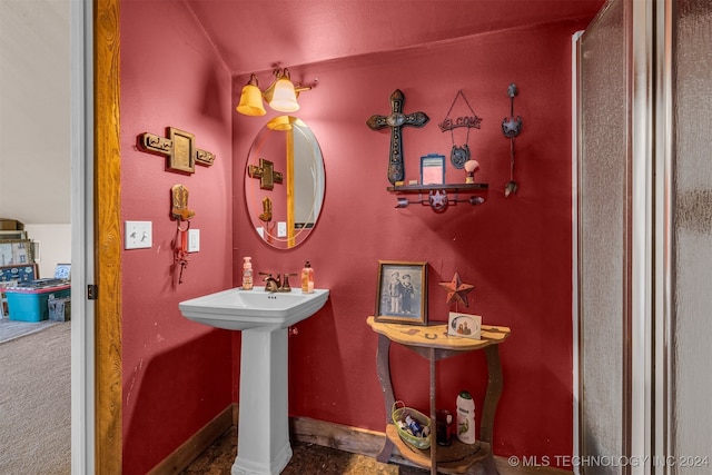 bathroom with lofted ceiling