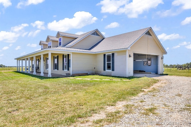 view of front of house featuring covered porch and a front lawn