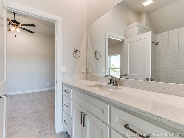 bathroom featuring vanity and ceiling fan