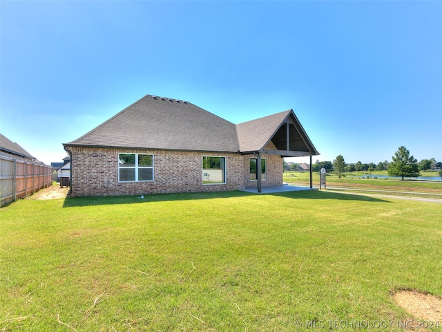 exterior space featuring a front lawn