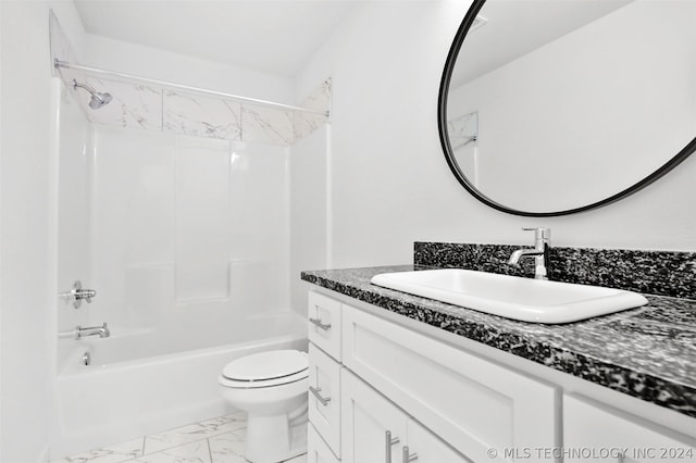 full bathroom with vanity, toilet, and washtub / shower combination