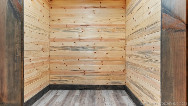 view of sauna with hardwood / wood-style flooring