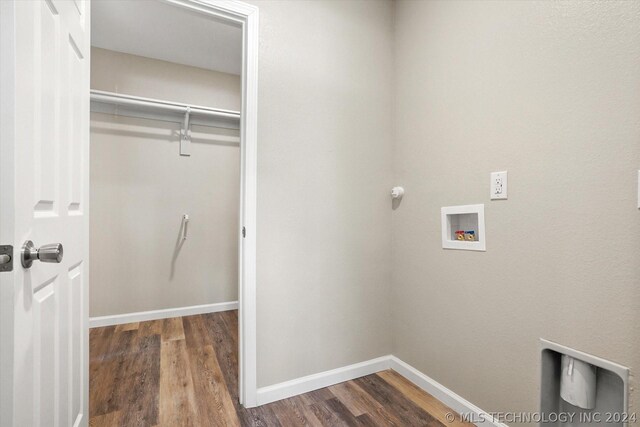 washroom with washer hookup and dark wood-type flooring