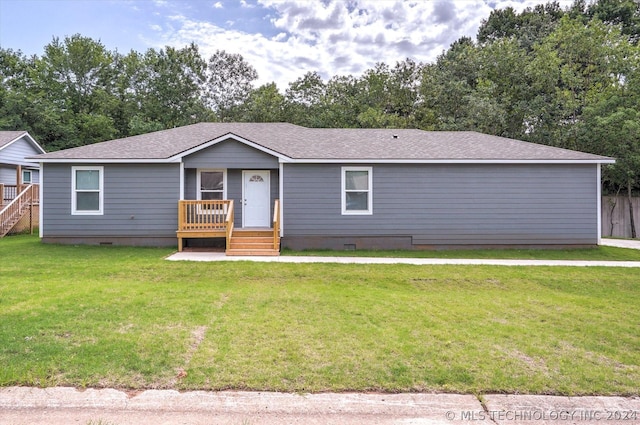 view of front facade with a front yard