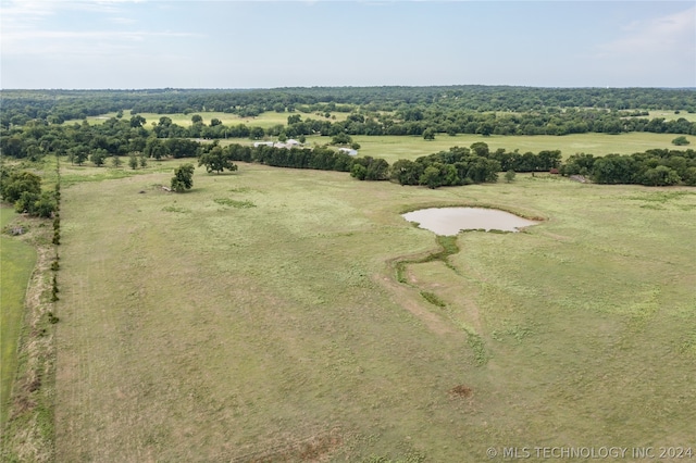 bird's eye view with a rural view and a water view