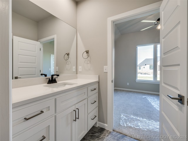 bathroom with vanity and ceiling fan