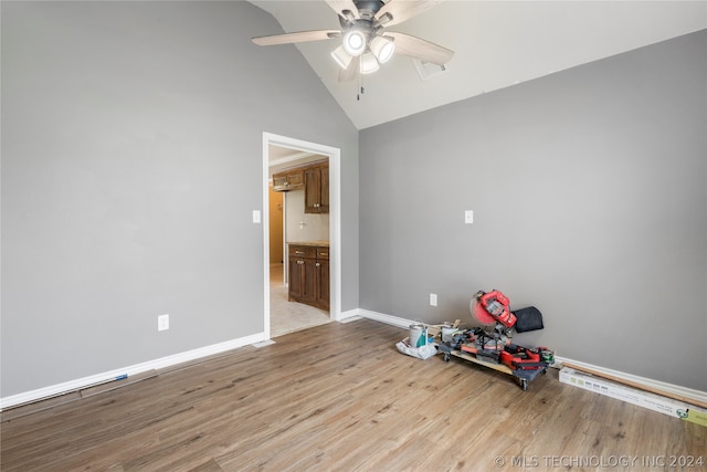 interior space featuring high vaulted ceiling, wood-type flooring, and ceiling fan