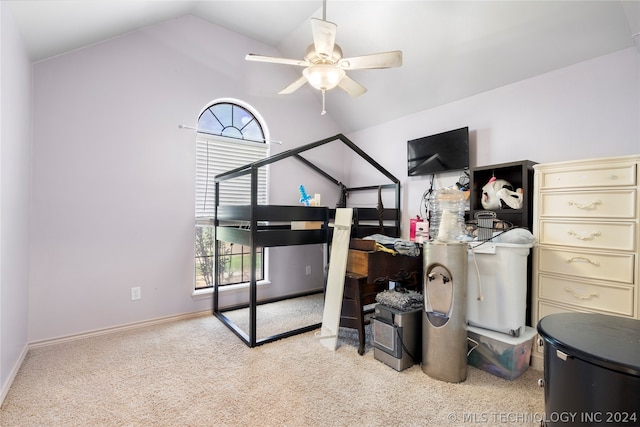 carpeted bedroom with vaulted ceiling and ceiling fan