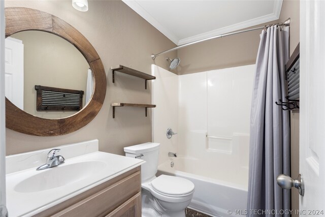 full bathroom with crown molding, toilet, oversized vanity, and shower / bath combo with shower curtain