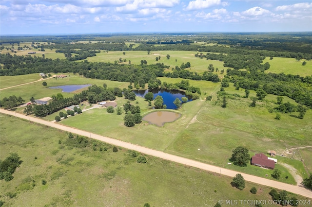 bird's eye view with a rural view and a water view