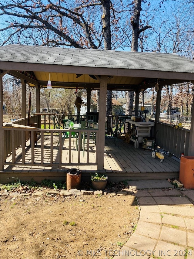 wooden deck featuring a gazebo