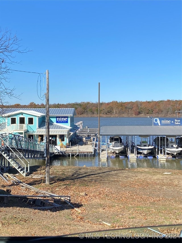 dock area featuring a water view